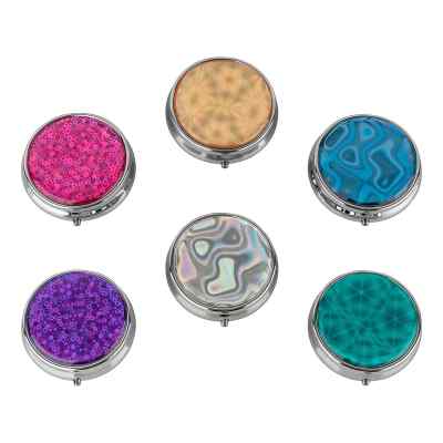 Pilulier rond hologramme 3 compartiments assorti (1 pièce)